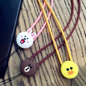 Adorable brown bear phone necklace .